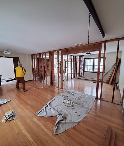 Close inspection of structural framing inside a Connecticut home